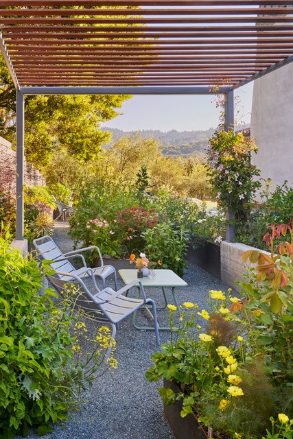 a residential landscape and back patio area.